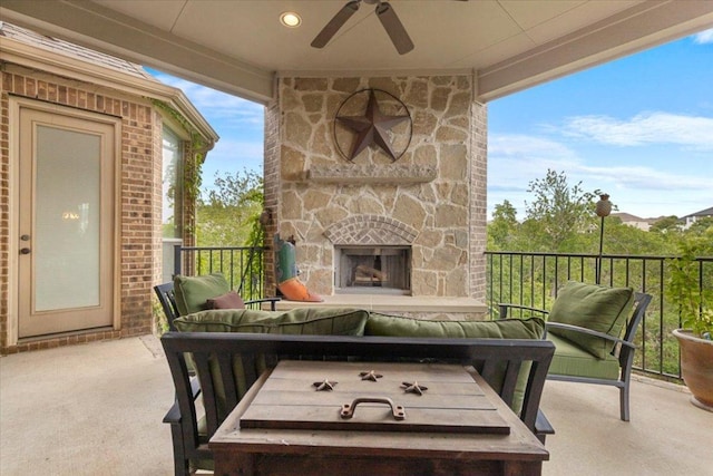 2308 First Vw, Leander, TX 78641 - view of patio / terrace featuring ceiling fan and an outdoor living space with a fireplace