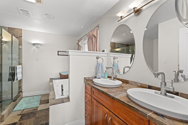 18917 Peckham Dr, Point Venture, TX 78645 - bathroom featuring double vanity, a stall shower, and a bath
