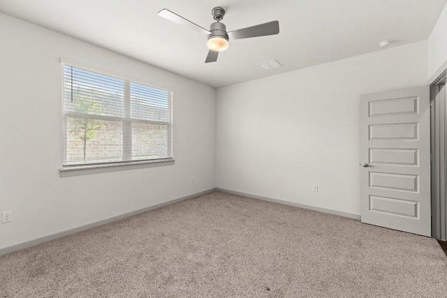7707 Jackson Graham Dr, Austin, TX 78724 - carpeted empty room with ceiling fan and a smoke detector