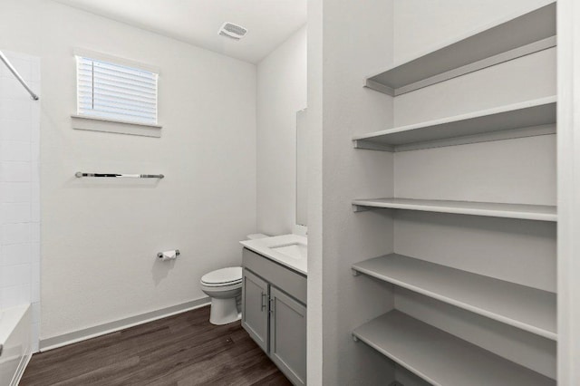 7707 Jackson Graham Dr, Austin, TX 78724 - bathroom with vanity, wood finished floors, and shower / bath combination