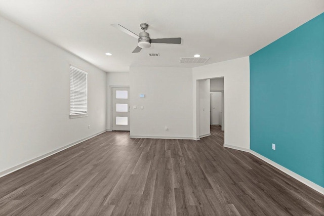 7707 Jackson Graham Dr, Austin, TX 78724 - unfurnished living room with a ceiling fan, wood finished floors, and recessed lighting