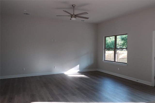 126 E Pauwela Ln, Bastrop, TX 78602 - empty room featuring dark wood-type flooring and a ceiling fan