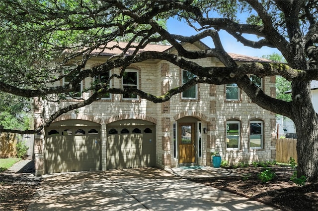 11003 Watchful Fox Dr, Austin, TX 78748 - french country inspired facade featuring stone siding, driveway, and a garage