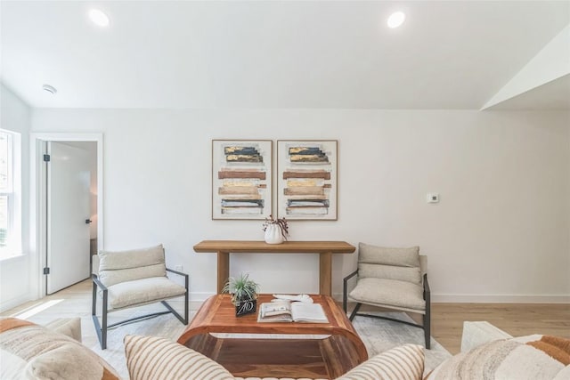 11403 Guernsey Dr, Austin, TX 78758 - living room with recessed lighting, light wood-type flooring, and lofted ceiling