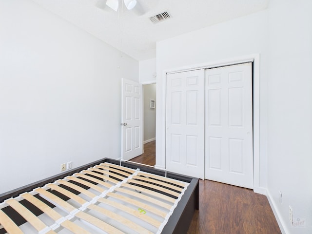 2300 Leon St Unit 205, Austin, TX 78705 - unfurnished bedroom with dark wood-style floors, a closet, and ceiling fan