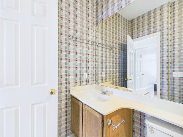 2300 Leon St Unit 205, Austin, TX 78705 - half bath featuring wallpapered walls and vanity