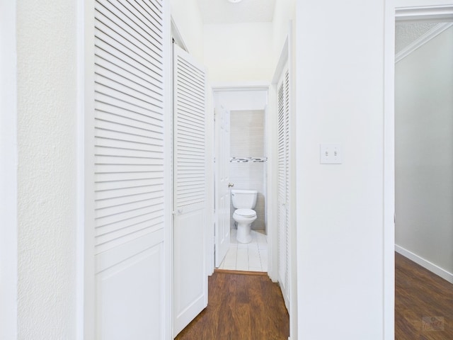 2300 Leon St Unit 205, Austin, TX 78705 - hallway featuring dark wood finished floors and ornamental molding