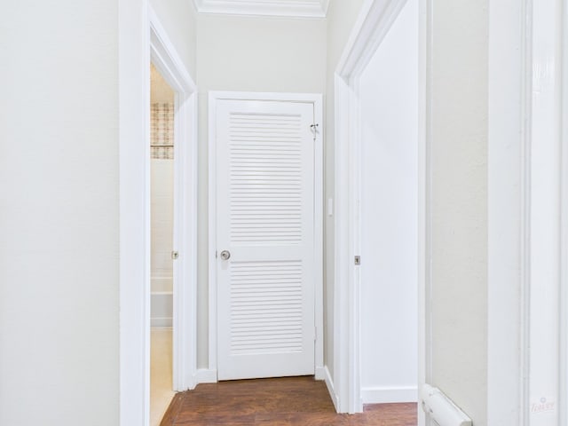 2300 Leon St Unit 205, Austin, TX 78705 - corridor featuring dark wood finished floors and baseboards