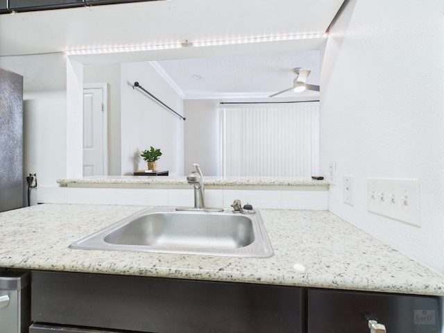 2300 Leon St Unit 205, Austin, TX 78705 - kitchen with light stone countertops and crown molding