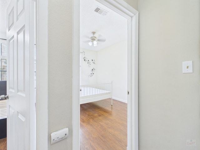 2300 Leon St Unit 205, Austin, TX 78705 - corridor with wood finished floors and baseboards