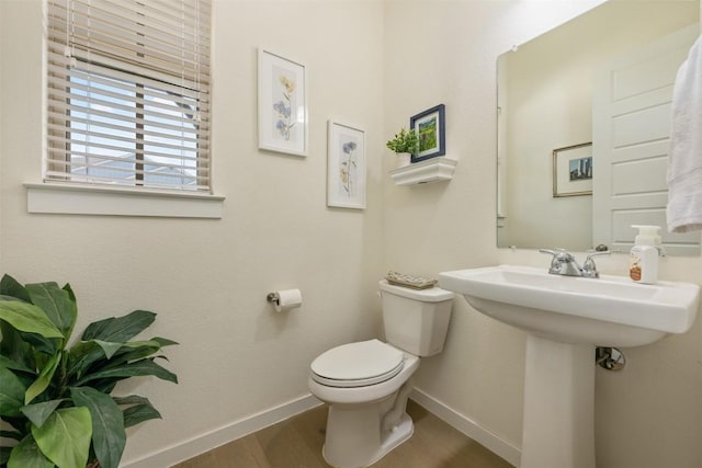 202 Hazy Hills Loop, Dripping Springs, TX 78620 - half bath featuring baseboards and wood finished floors