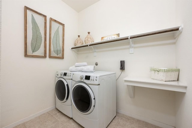 202 Hazy Hills Loop, Dripping Springs, TX 78620 - washroom with washer and clothes dryer and light tile patterned floors