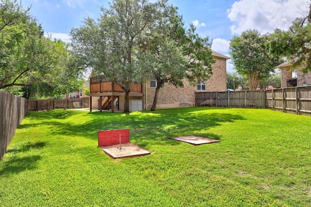 1901 Phantom Horse, Leander, TX 78641 - fenced backyard with stairs and a deck