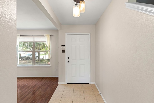 201 Windridge Dr N, Lockhart, TX 78644 - foyer entrance featuring baseboards and light wood finished floors