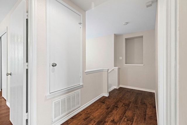 201 Windridge Dr N, Lockhart, TX 78644 - hall featuring dark wood-style floors and baseboards