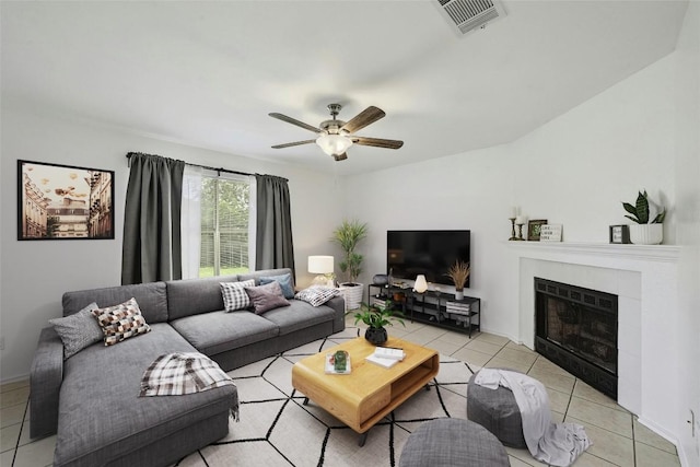 2309 New Hope Spur, Cedar Park, TX 78613 - living room with light tile patterned floors, a fireplace, and ceiling fan