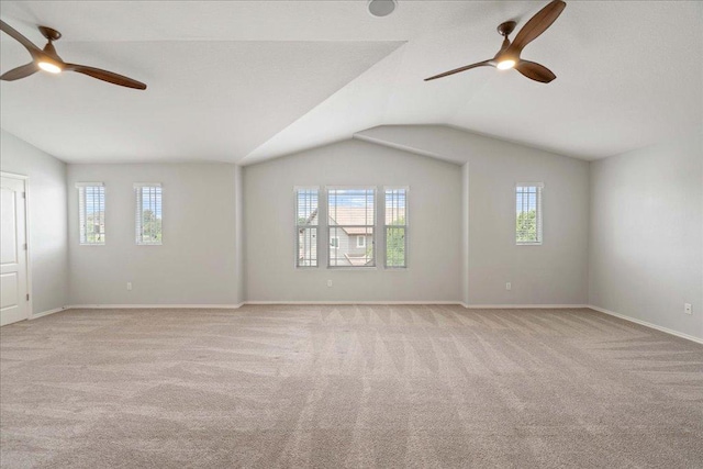 15 Stone Terrace Dr, Austin, TX 78734 - empty room featuring ceiling fan, light colored carpet, healthy amount of natural light, and vaulted ceiling