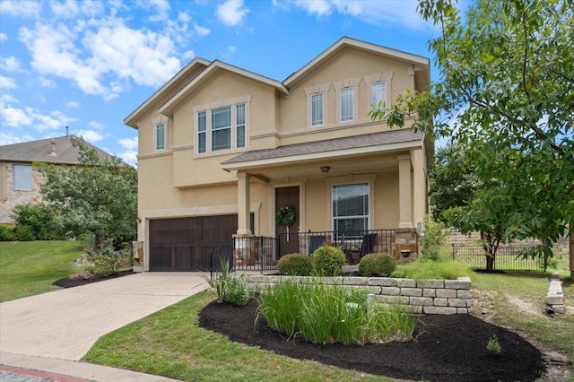 15 Stone Terrace Dr, Austin, TX 78734 - view of front of property featuring a garage, stucco siding, a porch, and driveway
