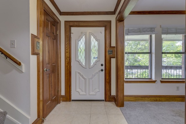 506 Applewood Dr, Pflugerville, TX 78660 - foyer with crown molding, light tile patterned flooring, and stairs