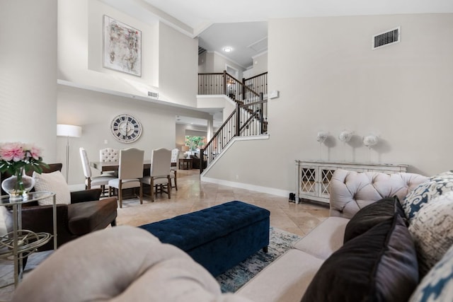 10919 Sierra Oaks, Austin, TX 78759 - living area featuring a towering ceiling and stairs
