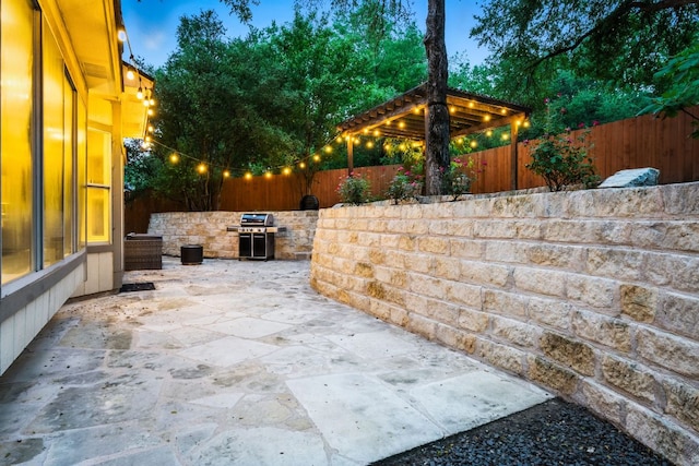 10919 Sierra Oaks, Austin, TX 78759 - fenced backyard featuring a patio and an outdoor kitchen