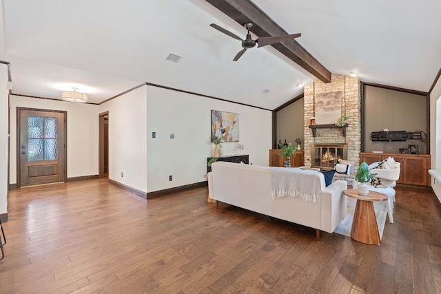 2717 Jorwoods Dr, Austin, TX 78745 - living area featuring ceiling fan, a large fireplace, and wood finished floors