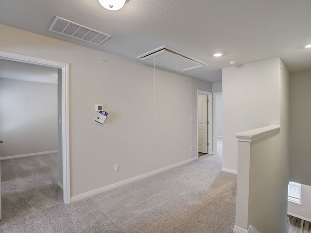 1850 Settlers Glen Dr Unit 404, Round Rock, TX 78665 - empty room featuring attic access, carpet, and recessed lighting