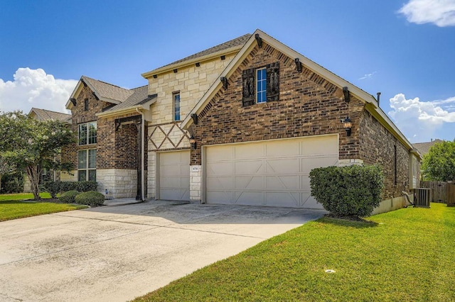 6716 Calabria Dr, Round Rock, TX 78665 - view of front of house featuring stone siding, an attached garage, driveway, brick siding, and a shingled roof