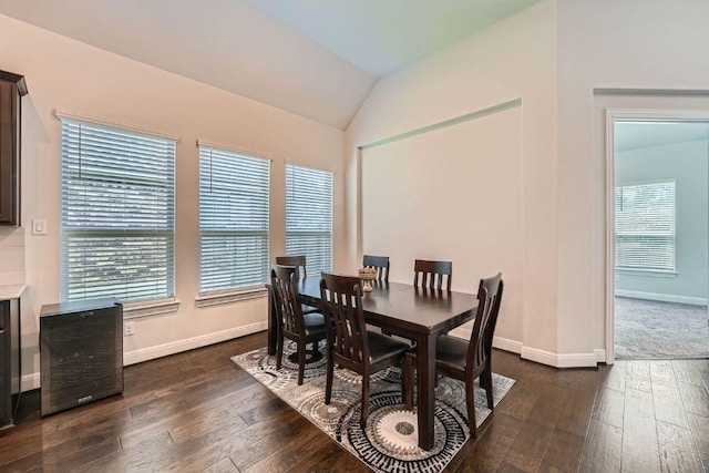 6716 Calabria Dr, Round Rock, TX 78665 - dining space with dark wood finished floors, lofted ceiling, and beverage cooler