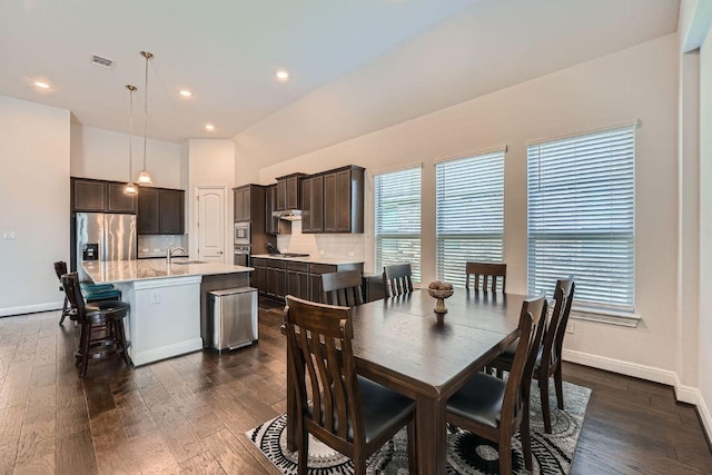 6716 Calabria Dr, Round Rock, TX 78665 - dining space with dark wood-style floors and recessed lighting