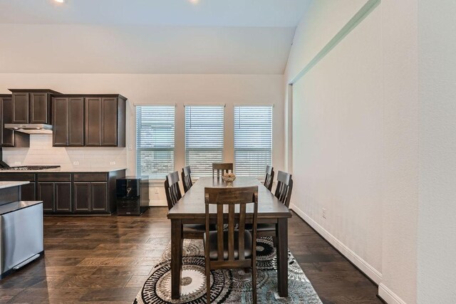 6716 Calabria Dr, Round Rock, TX 78665 - dining area featuring dark wood-style floors and lofted ceiling