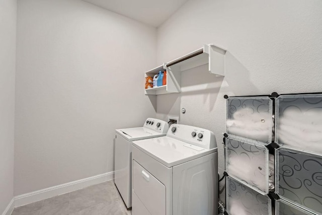 6716 Calabria Dr, Round Rock, TX 78665 - laundry room featuring washer and clothes dryer and baseboards