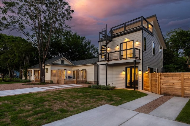 87 Chalmers Ave, Austin, TX 78702 - contemporary house with a balcony and a gate