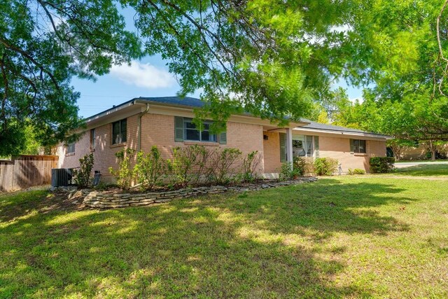 1001 E Applegate Dr, Austin, TX 78753 - ranch-style home featuring brick siding