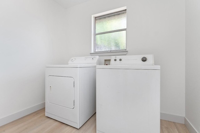 1001 E Applegate Dr, Austin, TX 78753 - laundry area with washer and dryer and light wood-style flooring