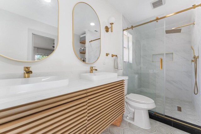 1001 E Applegate Dr, Austin, TX 78753 - bathroom with tile patterned flooring, double vanity, and a shower stall