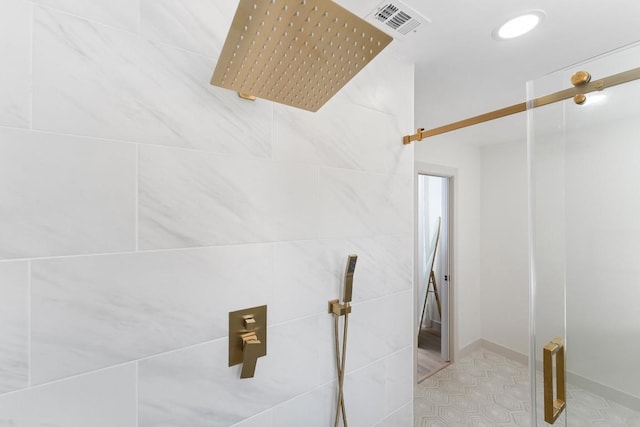 1001 E Applegate Dr, Austin, TX 78753 - bathroom featuring a tile shower and tile patterned floors