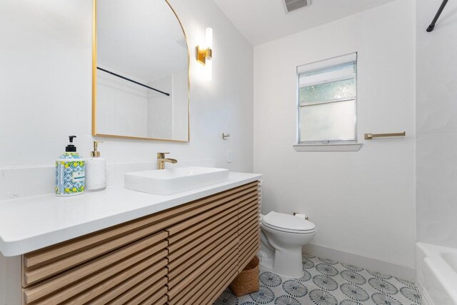 1001 E Applegate Dr, Austin, TX 78753 - bathroom with vanity and tub / shower combination