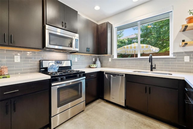301 W Stassney Ln Unit 11, Austin, TX 78745 - kitchen with stainless steel appliances, light countertops, tasteful backsplash, concrete flooring, and open shelves