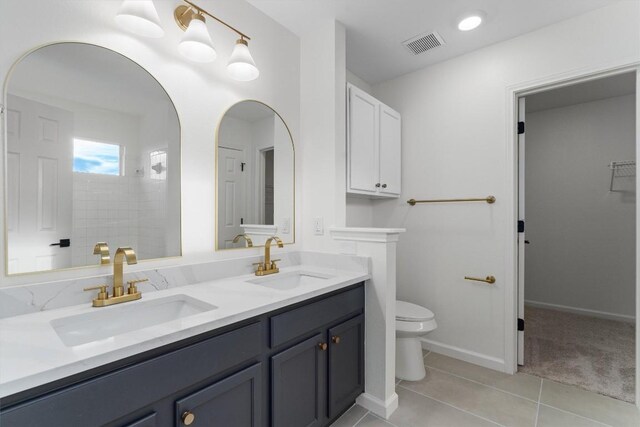 15532 Emmaleighs Ln, Pflugerville, TX 78660 - bathroom featuring double vanity and tile patterned flooring