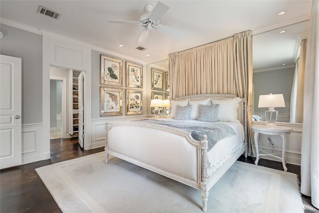2115 W 11th St, Austin, TX 78703 - bedroom with a decorative wall, crown molding, wood finished floors, recessed lighting, and a ceiling fan
