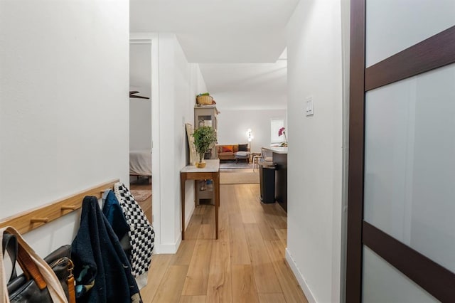 3431 N Hills Dr Unit 112, Austin, TX 78731 - corridor featuring light wood finished floors