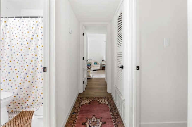 3431 N Hills Dr Unit 112, Austin, TX 78731 - hall with baseboards and wood finished floors