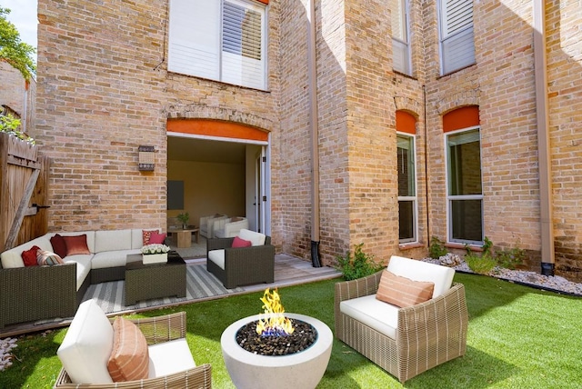 3431 N Hills Dr Unit 112, Austin, TX 78731 - view of patio / terrace featuring an outdoor living space with a fire pit