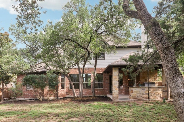 12404 Calistoga Way, Austin, TX 78732 - back of property with brick siding and stone siding