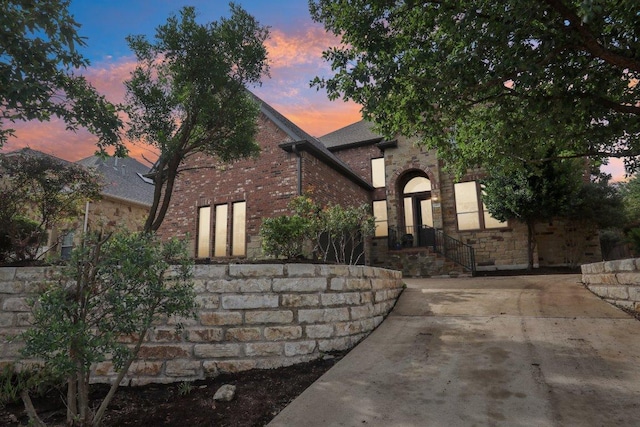 12404 Calistoga Way, Austin, TX 78732 - view of front of property with brick siding