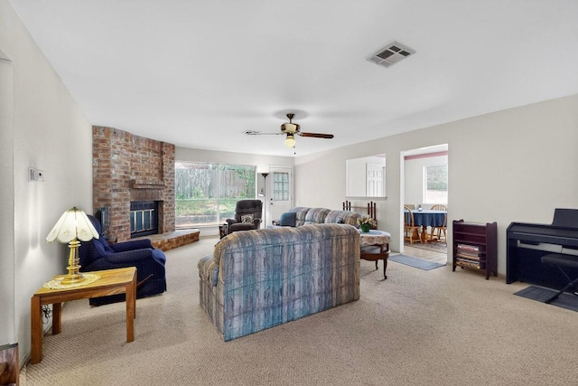 12062 Lincolnshire Dr, Austin, TX 78758 - living area featuring carpet, a brick fireplace, and a ceiling fan