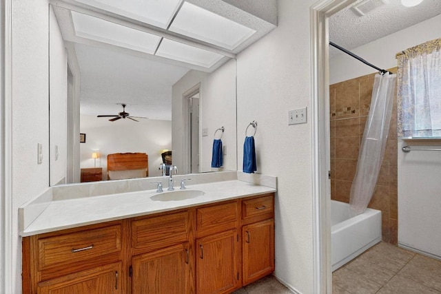 12062 Lincolnshire Dr, Austin, TX 78758 - full bath with vanity, shower / bath combo with shower curtain, tile patterned floors, and a ceiling fan