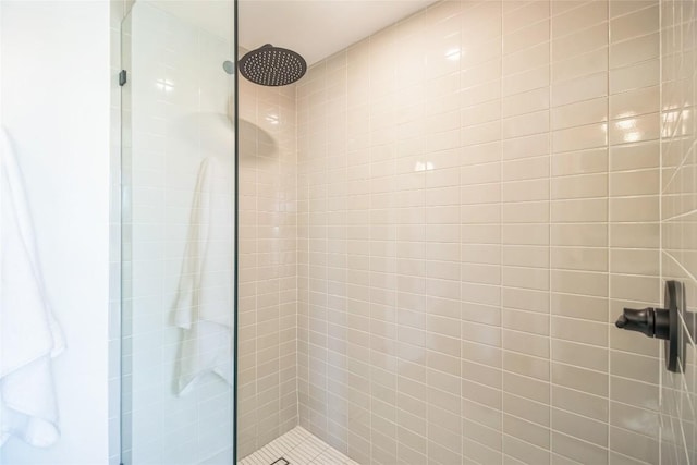 700 Denson Dr Unit 1104, Austin, TX 78752 - full bathroom featuring a tile shower