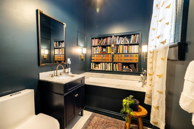624 Saint Louis St, Gonzales, TX 78629 - bathroom featuring vanity, tile patterned floors, and a bath